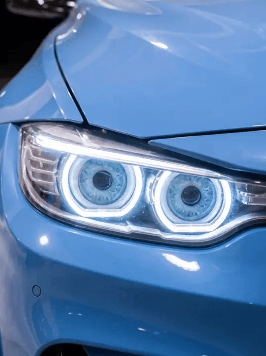 Blue BMW headlight with Eyes Blink installed